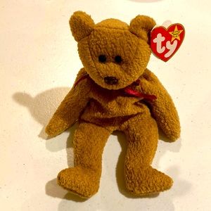 Ty rare retired beanie baby, curly the bear
